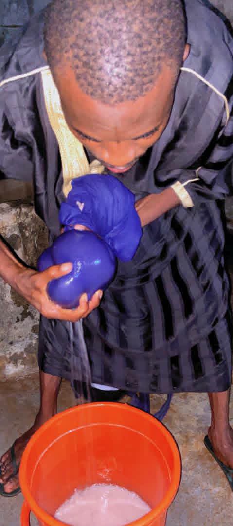 Our wives are not our slaves. Help them – Nigerian man says as he prepares raw pap while his wife slept