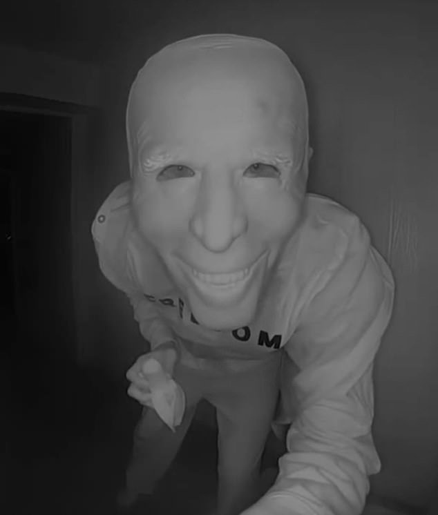 Terrifying nightmare as stranger in Biden mask eats banana on Texas family’s doorbell camera, before observers discover intruders disturbing hidden message