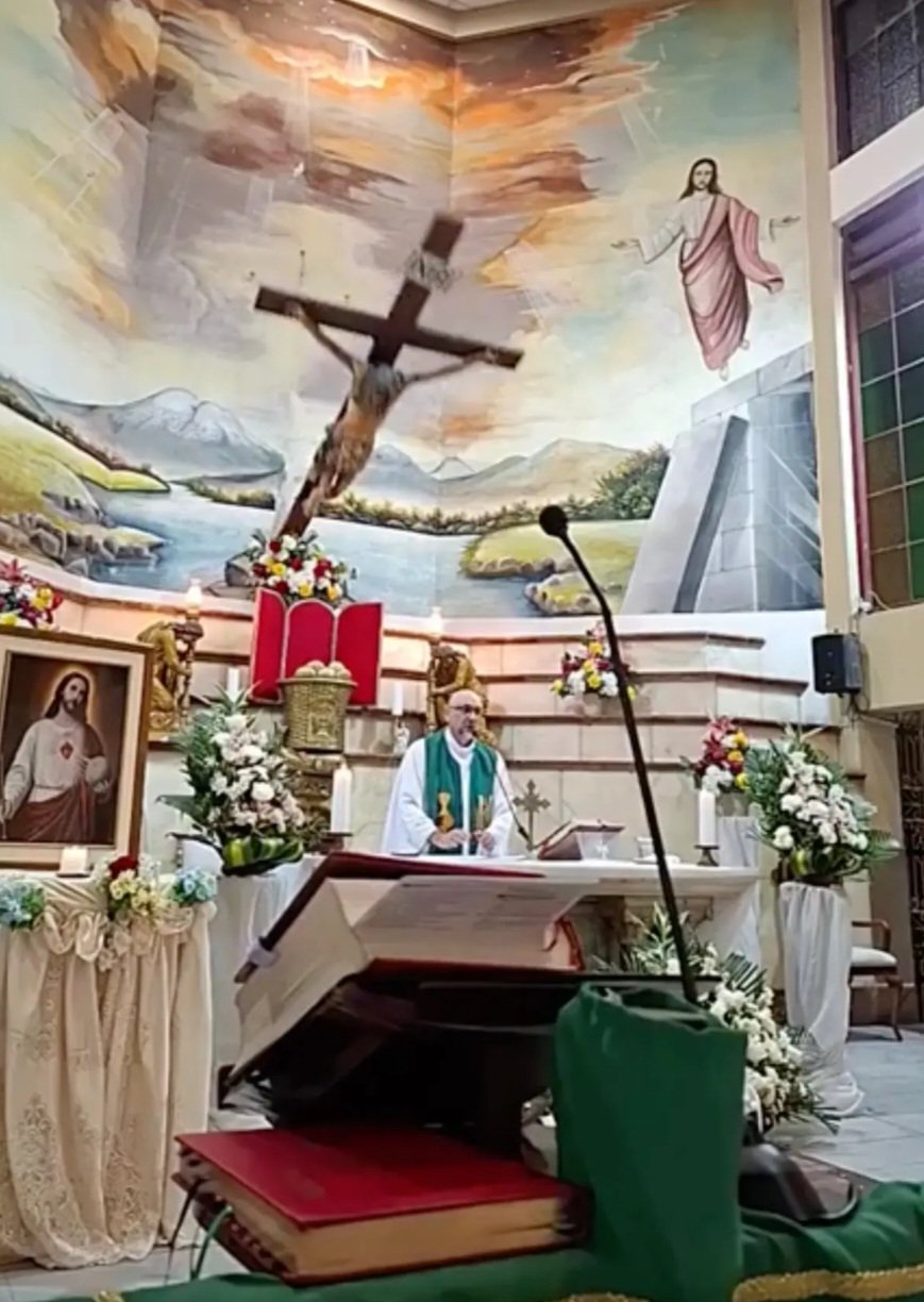 Priest who was slain on altar by falling crucifix was speaking to members about how fleeting life is