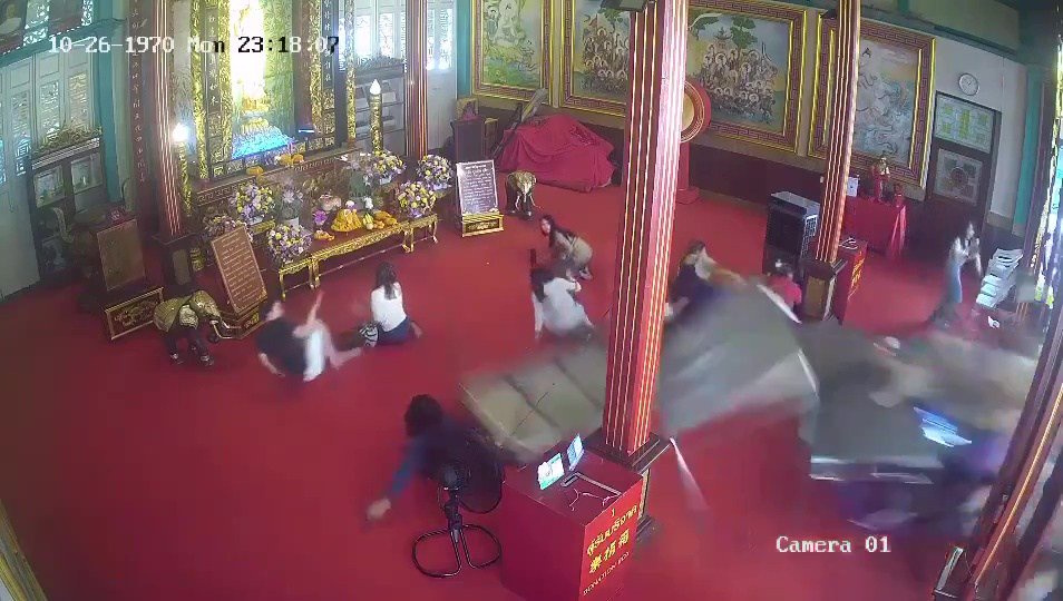 Shocking moment electric car ploughs into temple & ‘traps worshippers under vehicle’ – as three rushed to hospital