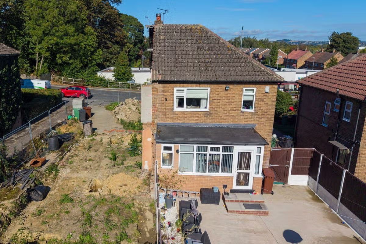 Dad who knocked down half a semi-detached house and then left UK speaks out
