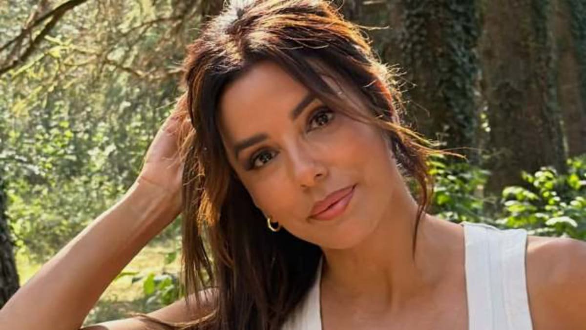Eva Longoria Almost Pops Out of Plunging Dior Coat Dress With Thigh-High Slit