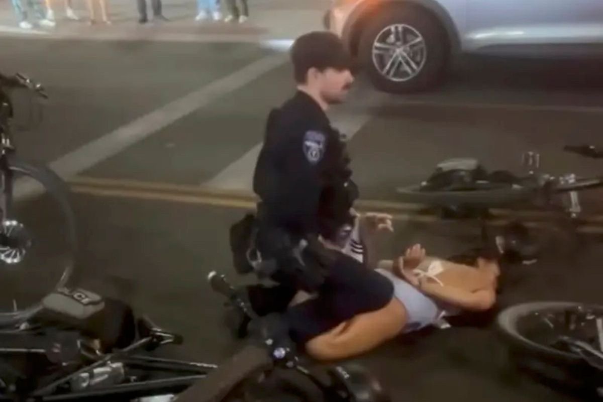 Viral video shows moment Arizona State cheerleader is shoved to ground and pummeled by cop