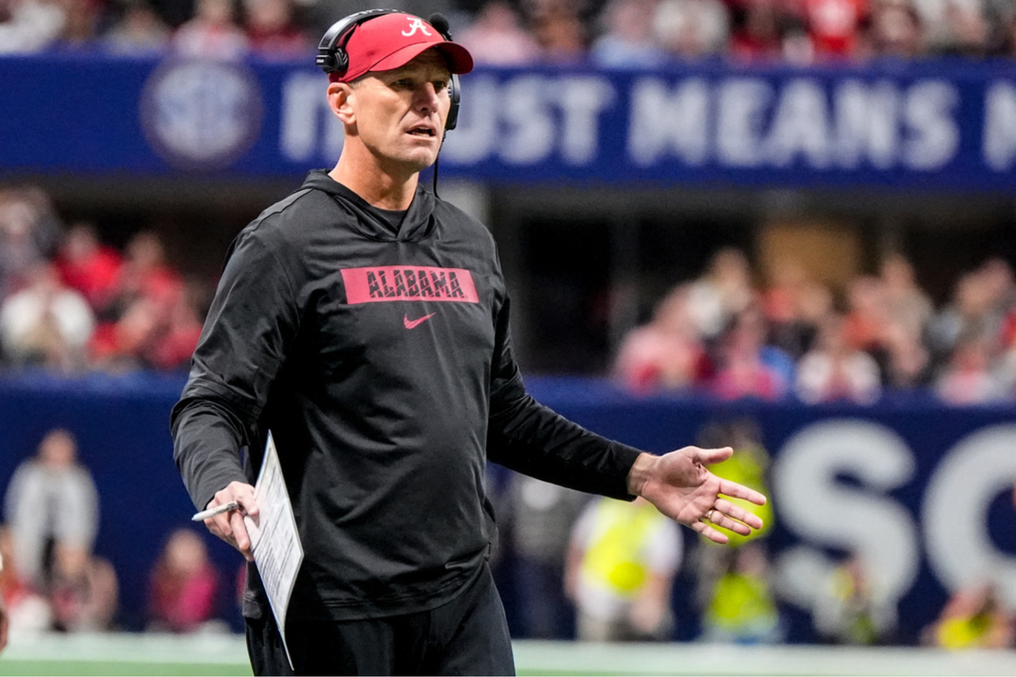Alabama coach Kalen DeBoer loses his temper on the sidelines with player Dijon Lee after a botched play