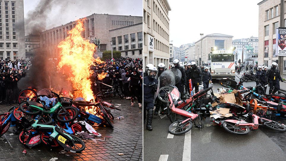 Student riots spread to Belgium as hooded protesters clash with cops