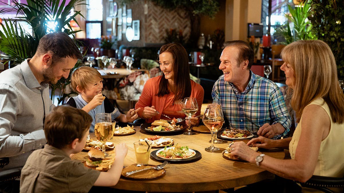 Dining with someone you love may help the body in surprising ways, new research suggests