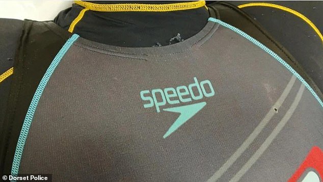 Police release images of wetsuit and swimming gear after unidentified body is found off exclusive Sandbanks peninsula