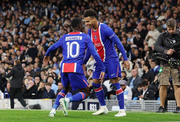 Quickfire Doué and Dembélé inspire PSG to wild win at Manchester City