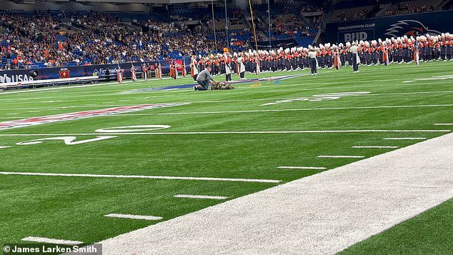 Airman who died from 150ft fall at college football game is identified