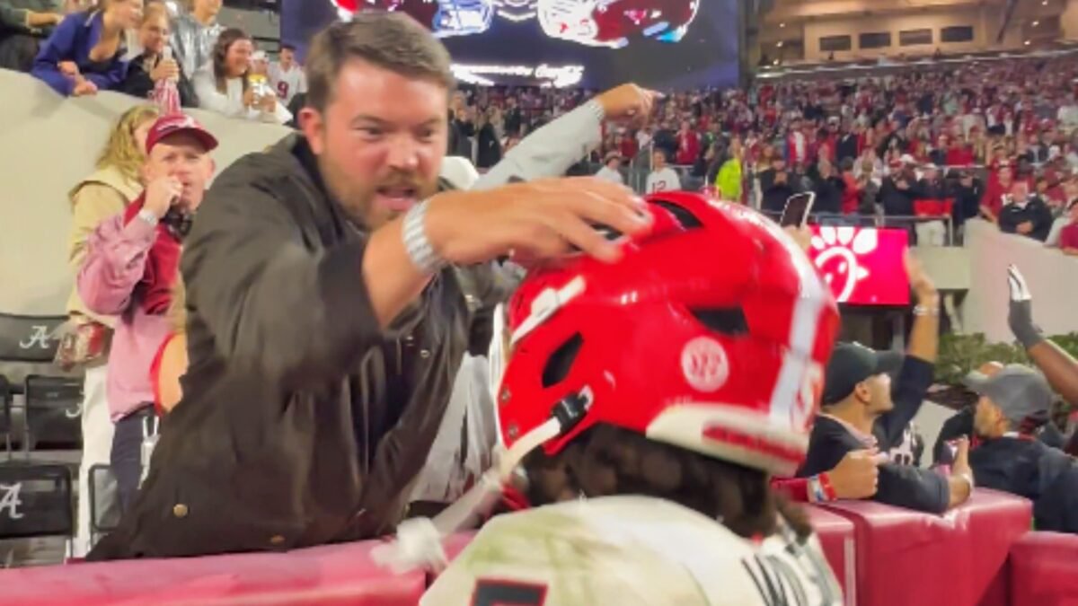 Alabama Fan Caught On Camera Attacking Georgia Player, Screams ‘Racist’ Remark At Him During Ugly Postgame Altercation [VIDEO]