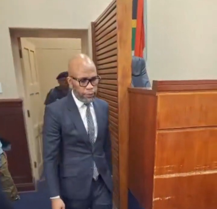Cat Matlala walks freely through the Germiston Magistrates’ Court in a suit