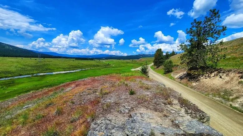 Nestled In Northwest Montana Is A Nature Escape With A Scenic Lake, Wetland Beauty, And Mountain Views