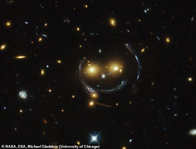 Say cheese! NASA reveals stunning image of giant ‘cosmic smile’ created by warped spacetime