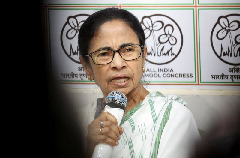 Mamata Banerjee heads to Delhi to back protest against CEC