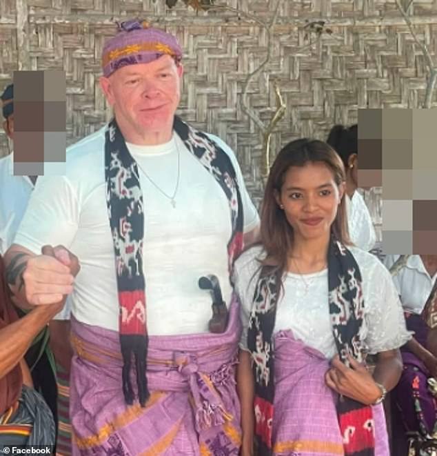 Ominous photo emerges of Aussie who beat and ate dog at wedding ceremony patting a new puppy: Fresh uproar erupts as cracks emerge with his new wife