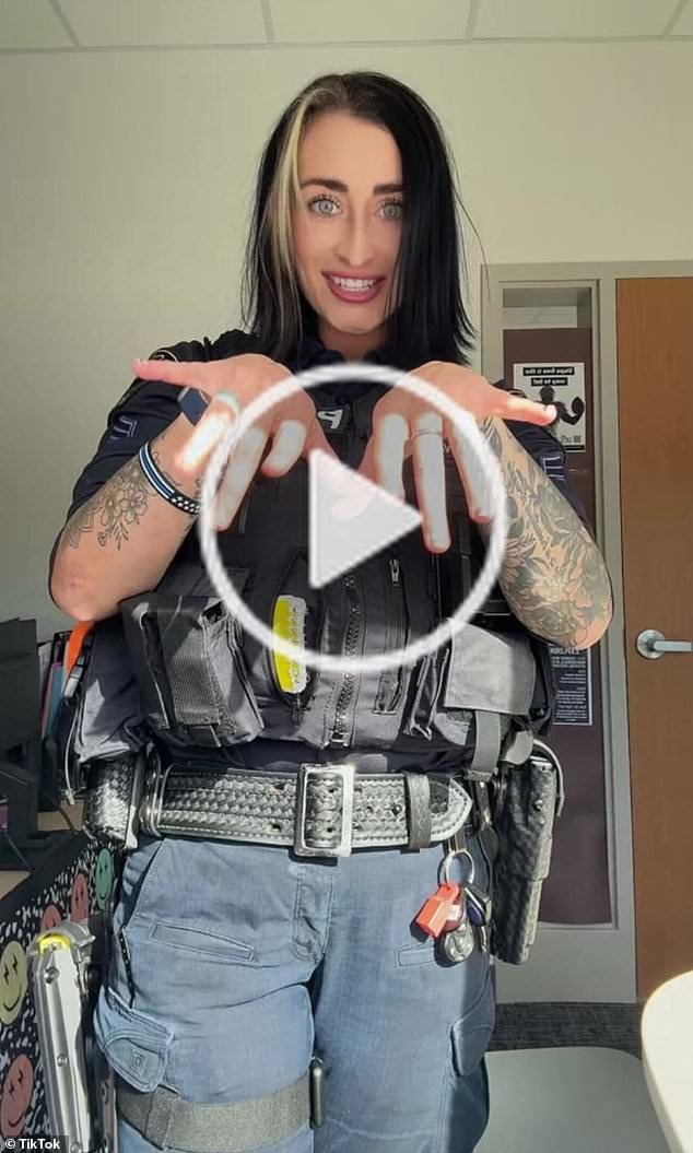 Female cop under investigation after posting video of herself in her uniform pretending to shoot a gun to ‘white girl wasted’ audio