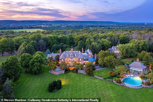 Insane mega-mansion complete with its own pub to be auctioned off with no reserve in hope of a quick sale