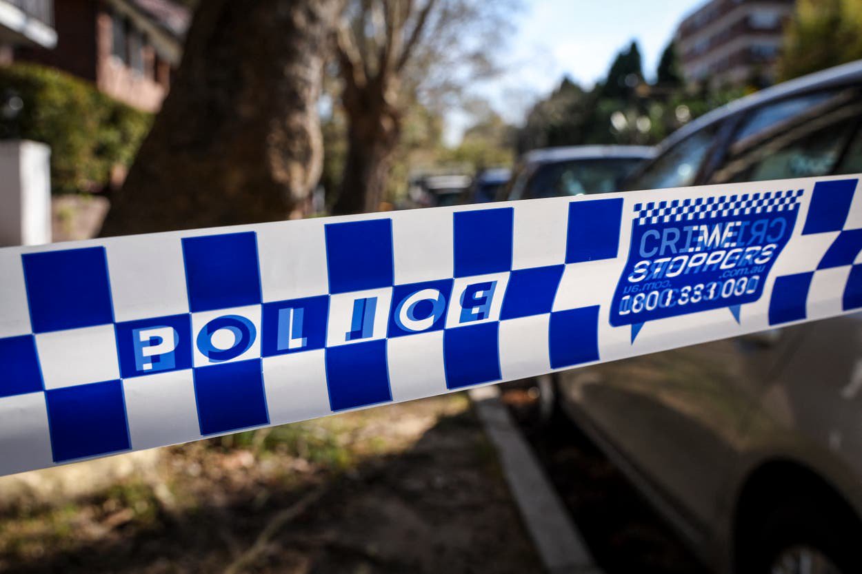 Man and woman charged after baby boy found dead in Australian motel