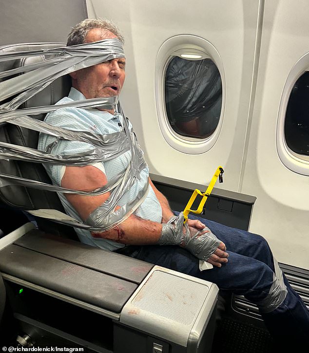 Plane passenger from hell who had to be DUCT-TAPED to his seat after mile-high meltdown breaks his silence