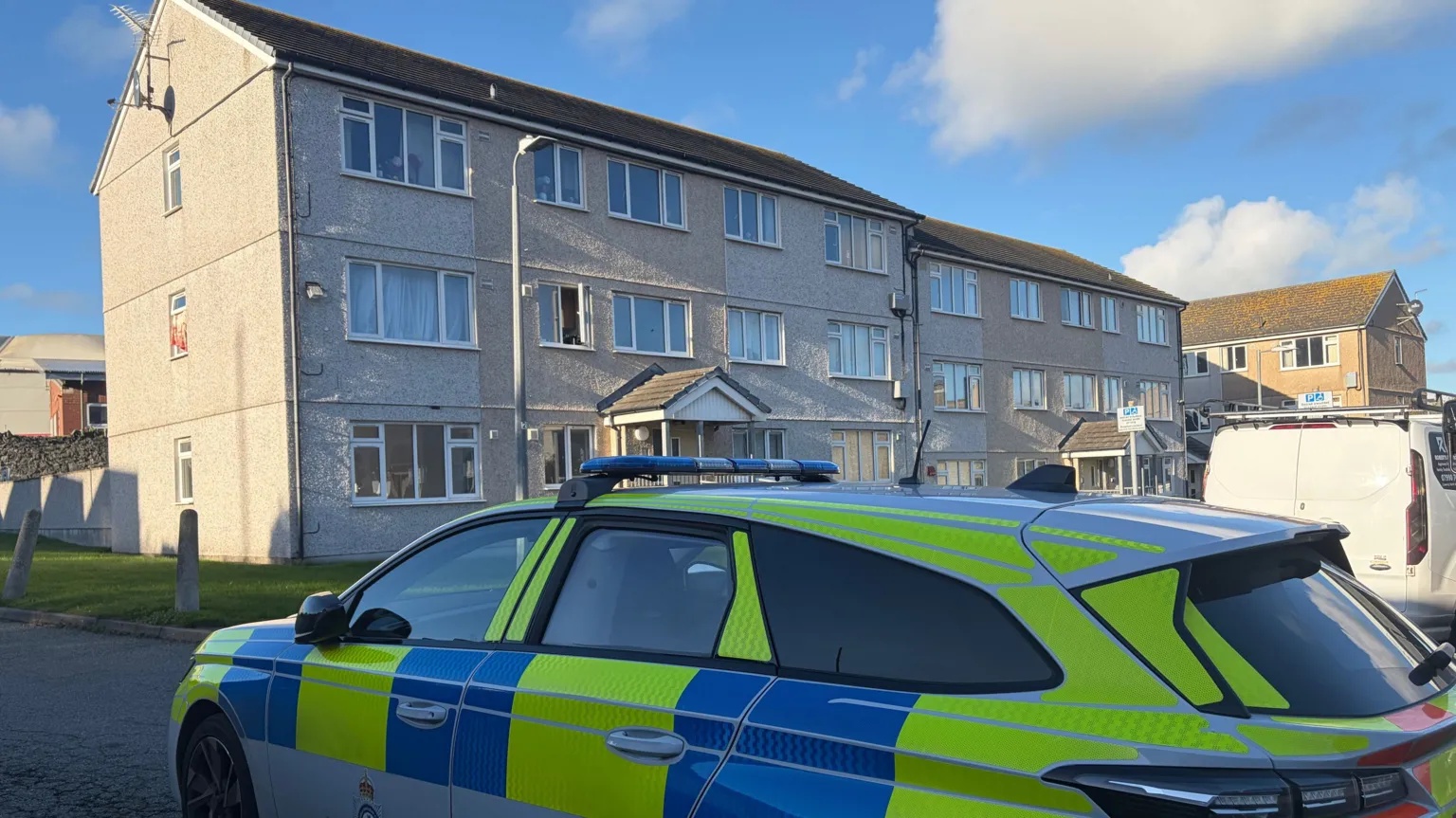 Man in court charged with murder after body discovered in flat