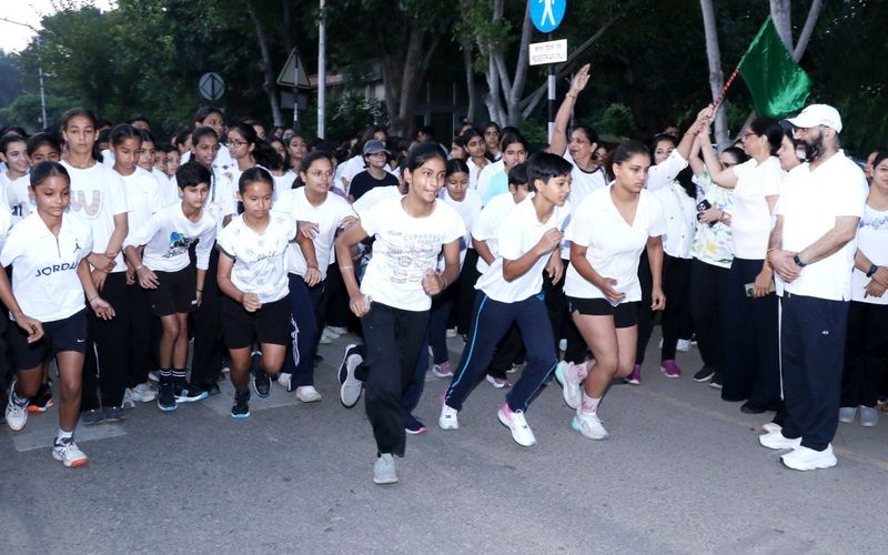 DAV Model School students, teachers take part in Run for DAV Marathon