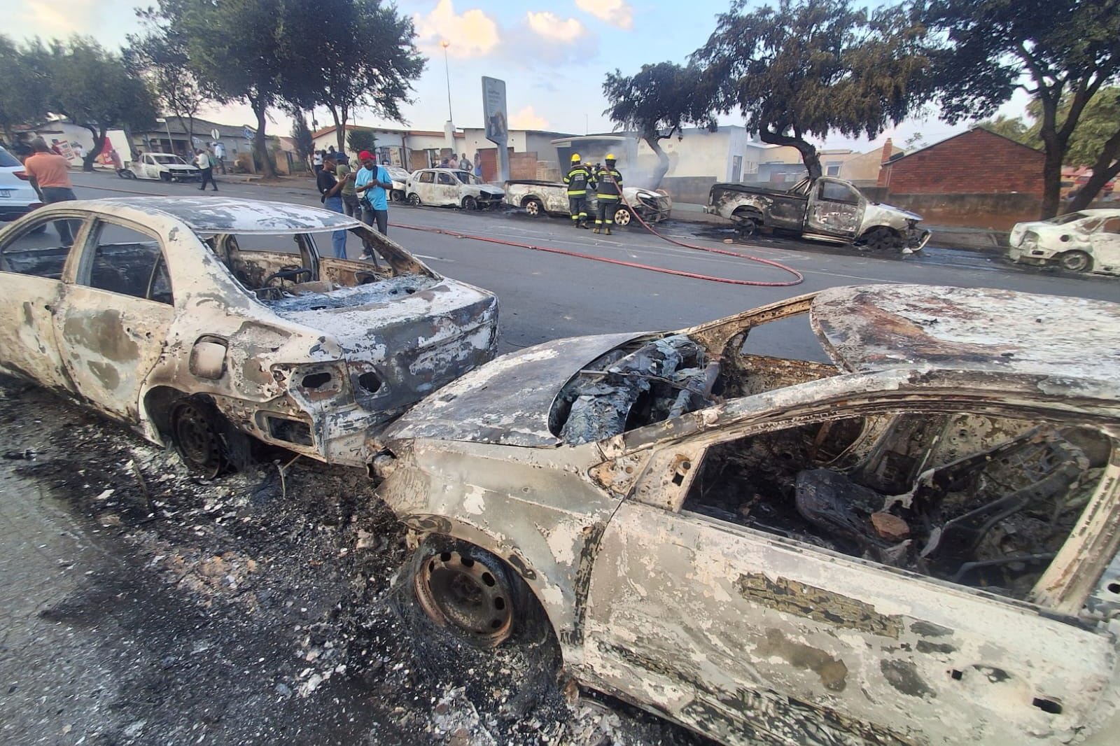 WATCH | 24 cars burnt, shops looted, foreigners evicted as asylum process sparks anger