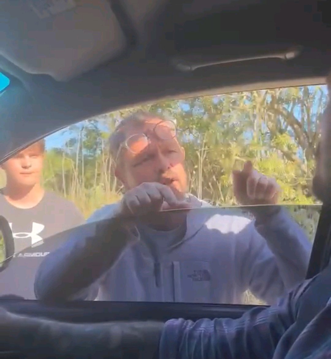 Motorists confront each other in a road rage incident in a rural farming area