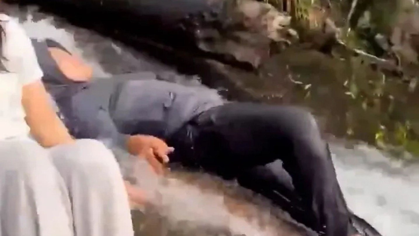 Woman, 25, slips on rocks at a waterfall and plunges over the edge to her death as her friends watch in horror