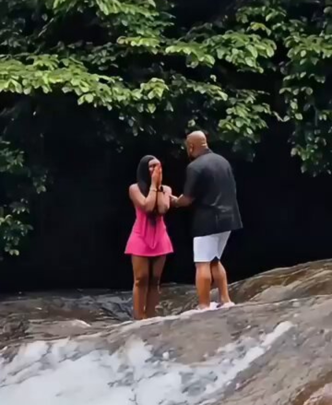 Man slips into fast water while proposing at a waterfall