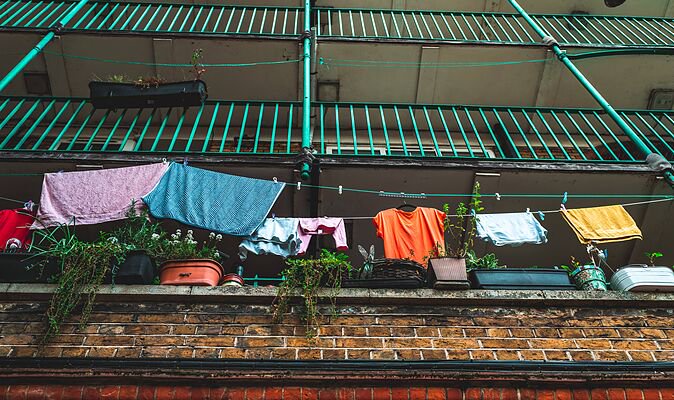 Resident livid after realising what neighbour hung on balcony