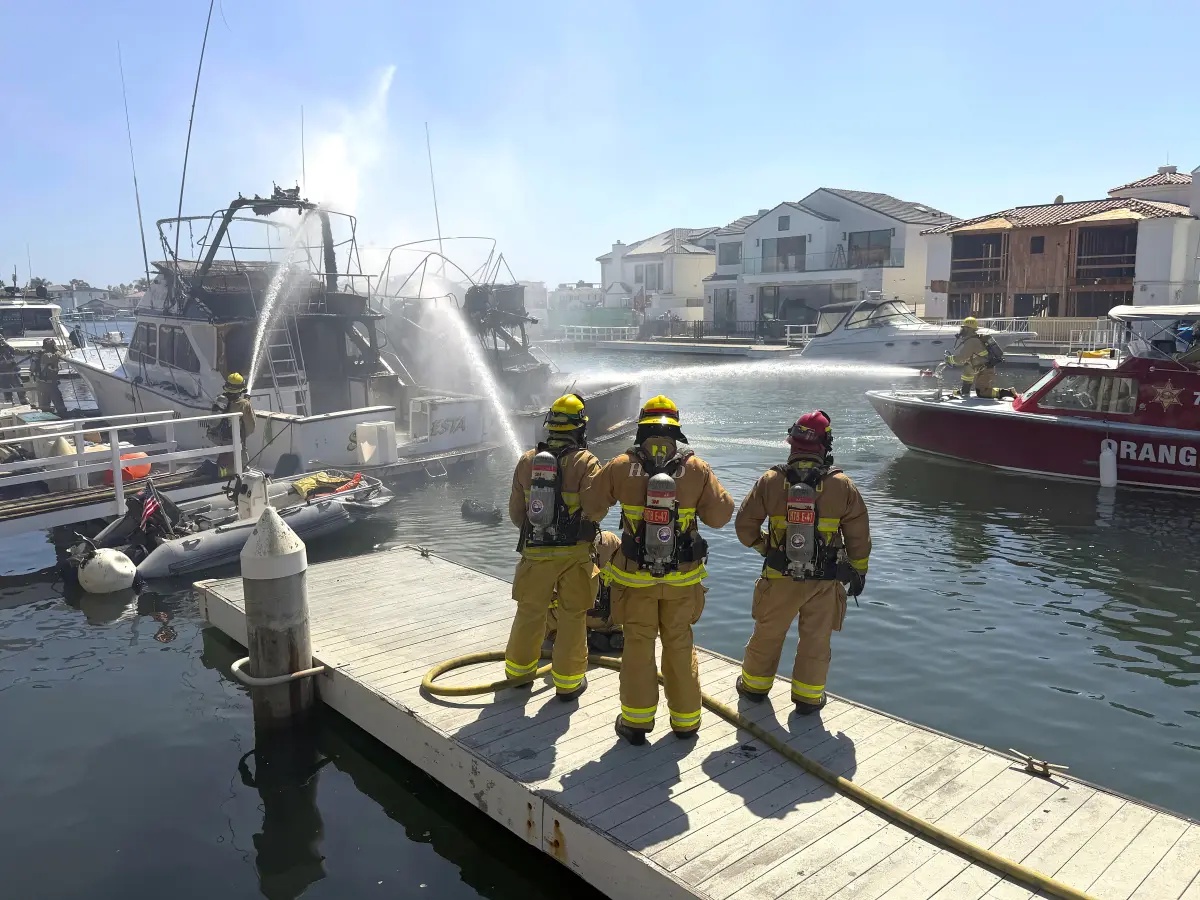 Two more boats up in flames in Huntington Harbour, one week after earlier fire