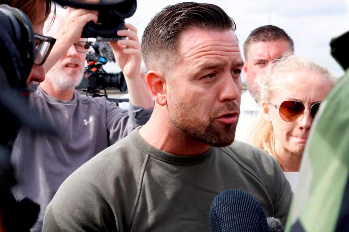 Danny ‘Tommo’ wears a crucifix as he appears in court accused of entering ‘restricted zone’