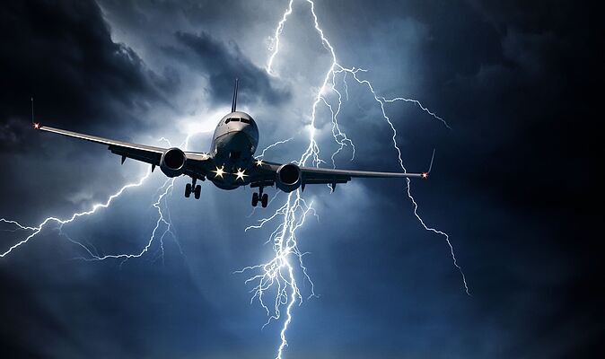 Horror as lightning strikes packed plane with holidaymakers terrified onboard