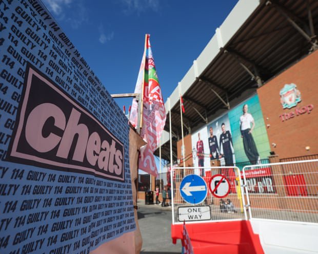 Police officer injured as 10 arrests made at tense Liverpool v Manchester City match