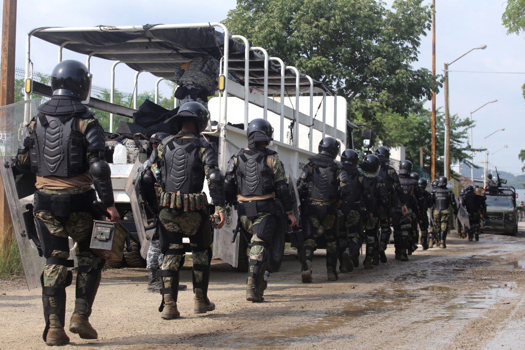 Child among 10 dead after inmates open fire during visiting hours at Mexico prison as 16 left injured