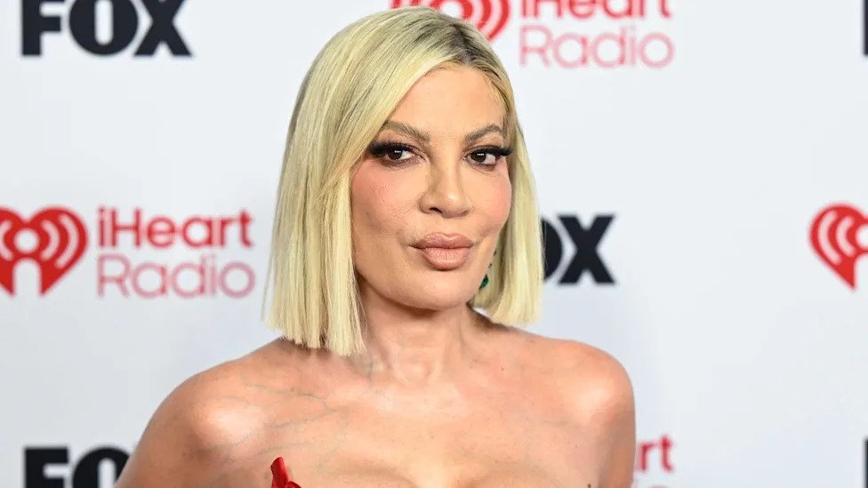 Tori Spelling looks unrecognizable in head-turning childhood photos