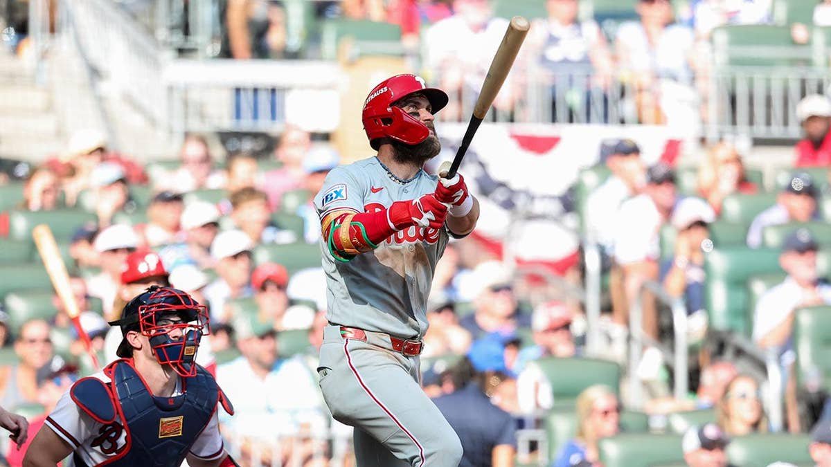 Phillies force Game 3 as Kyle Schwarber, Bryce Harper go back-to-back and Alec Bohm homers in 10th vs Braves