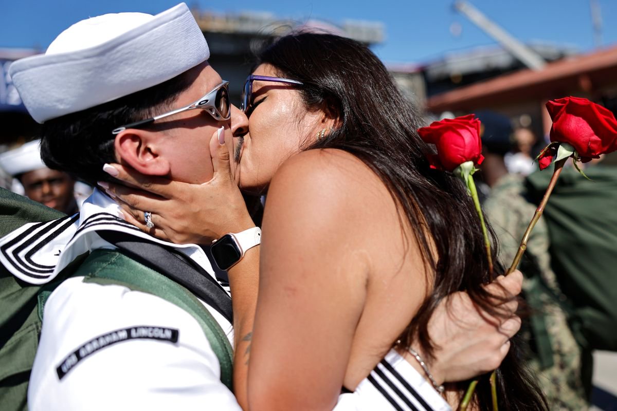Emotional scenes as US aircraft carrier returns home after record 260 consecutive days at sea