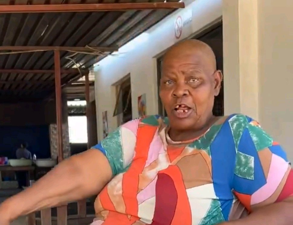 Elderly woman tells someone asking for an ANC vote to Voetsek