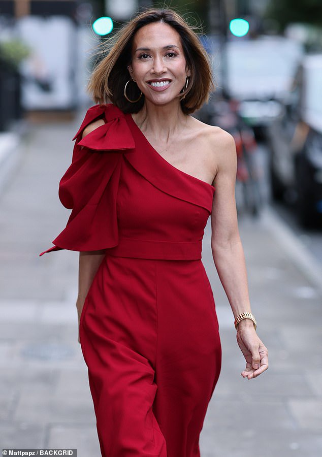 Myleene Klass struts her stuff in a red one-shoulder jumpsuit after snubbing Hear’Say reunion for being ‘too busy’
