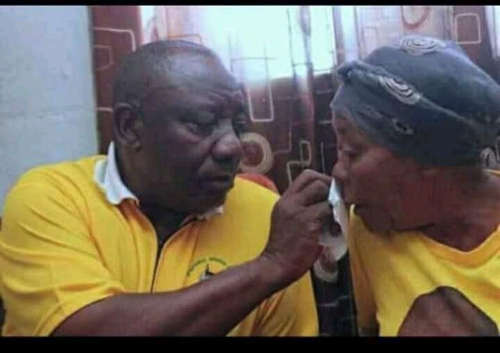 Cyril Ramaphosa pictured wiping an elderly Woman’s nose during a visit