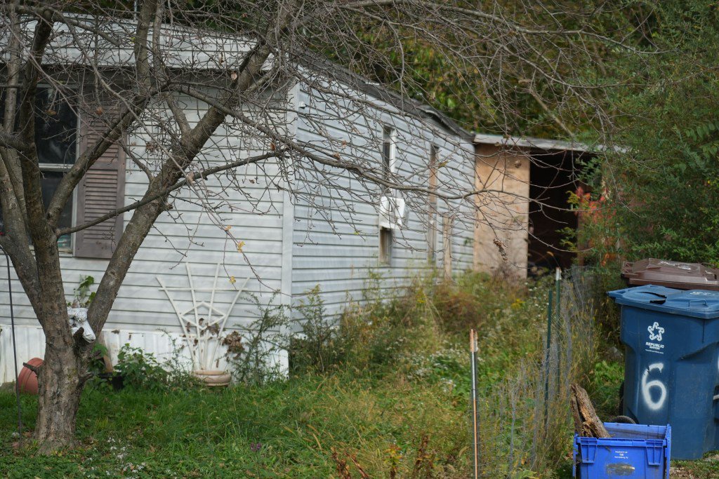 Parents arrested after NINE siblings found in ‘appalling’ home where ‘kids were placed in cages & lived in a shed’