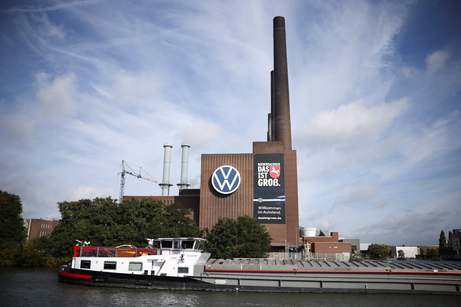 Volkswagen workers threaten strikes unless wage deals are reinstated