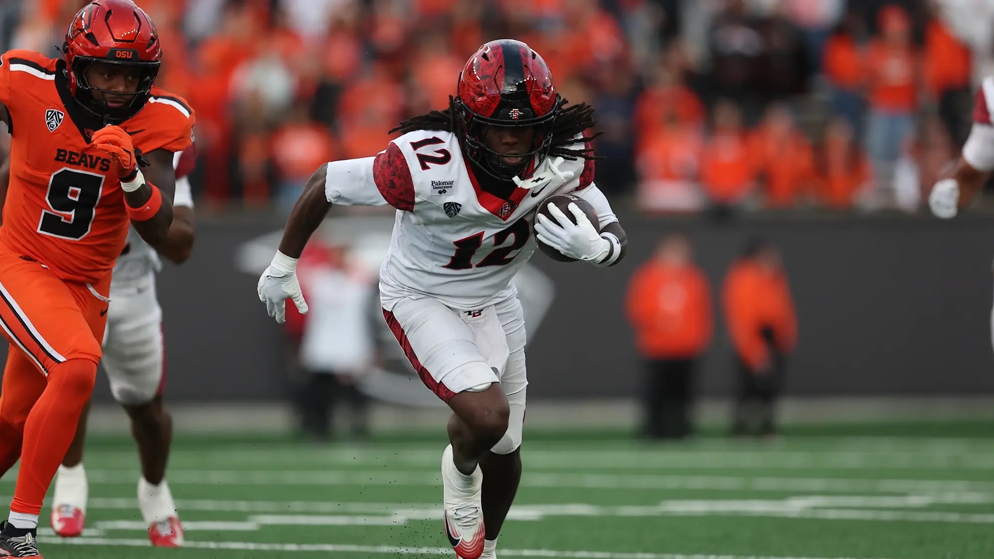 San Diego State freshman Jaylon Hawkins is doing something rarely seen in college football