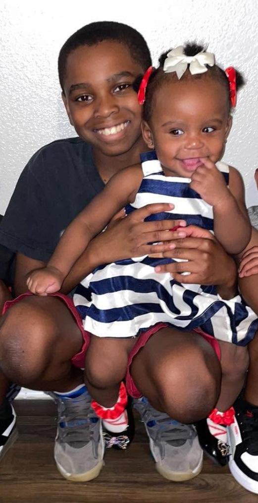 ‘Hero’ 13-year-old killed shielding younger sister from shooting