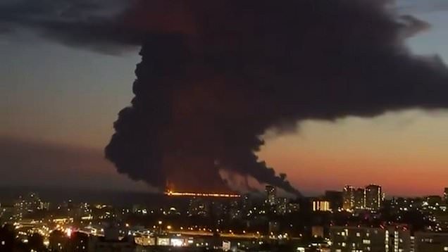 Moment Russian supply trucks speed away in flames from Ukrainian drone strikes