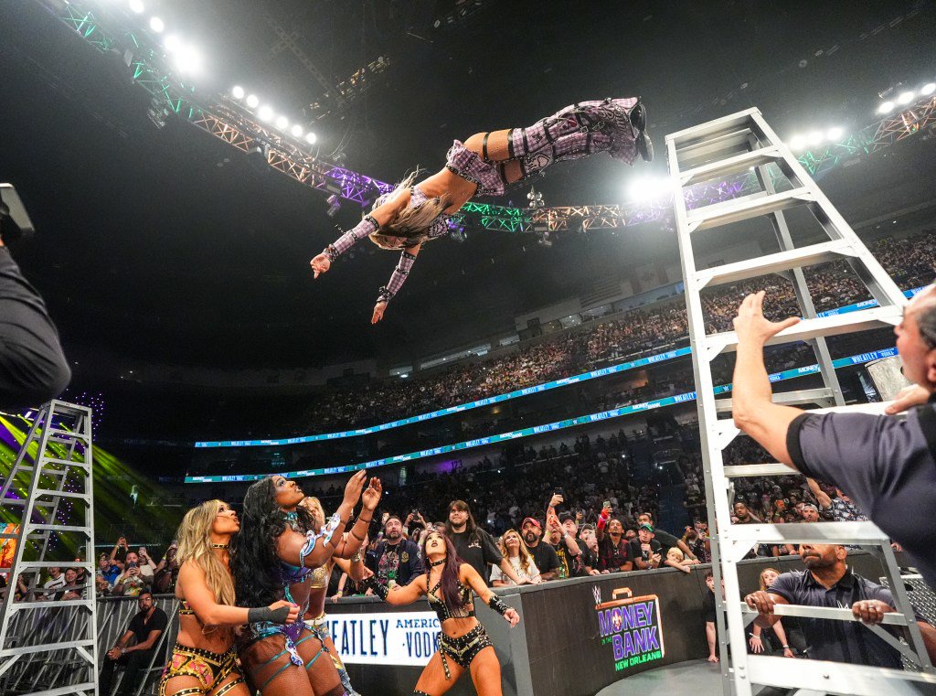 Terrifying moment WWE superstar Tiffany Stratton lands head first on floor after ladder move went badly wrong