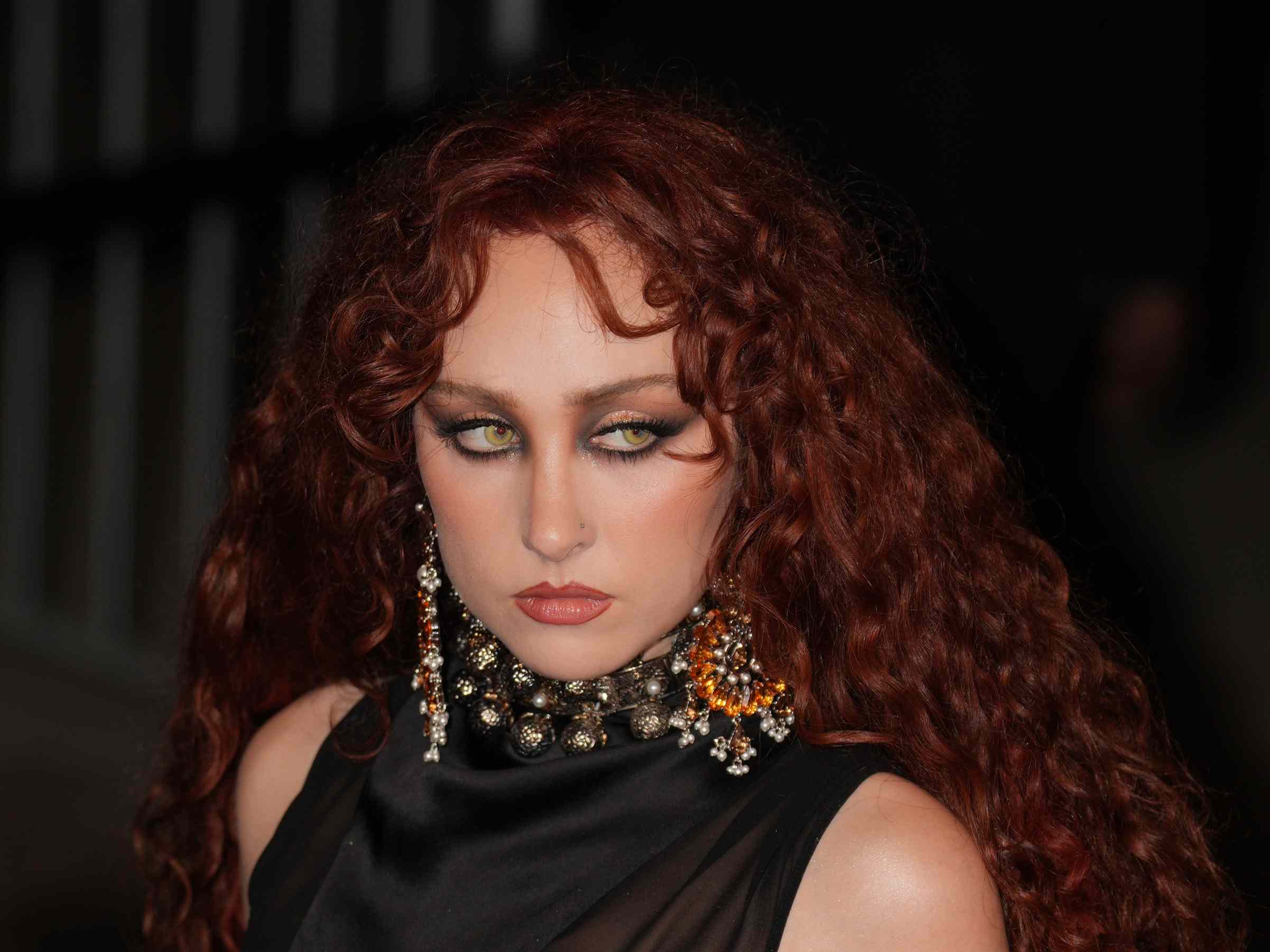 Chappell Roan Looks So Different Ditching Her Signature Red Curls for a Bold New Color in a Latex Minidress