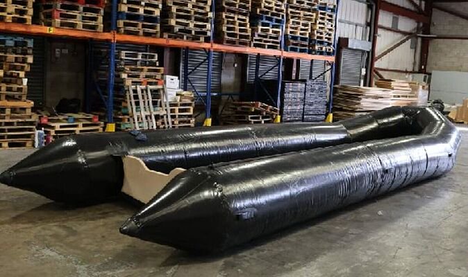 Inflatable boats capable of carrying 1,700 migrants across Channel seized at UK airport