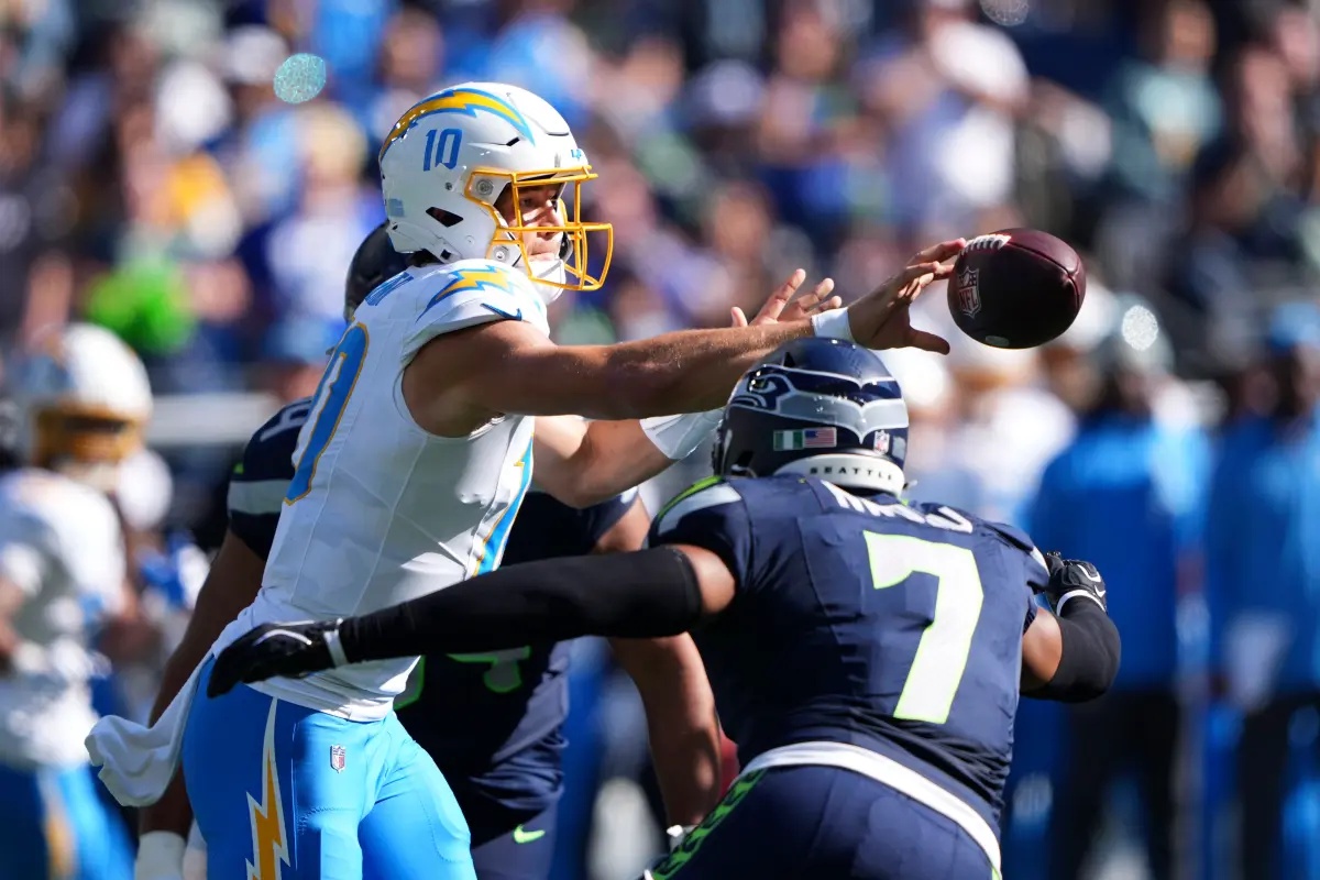 Chargers spiral to 0-4 as chaotic offense and turnovers doom comeback bid